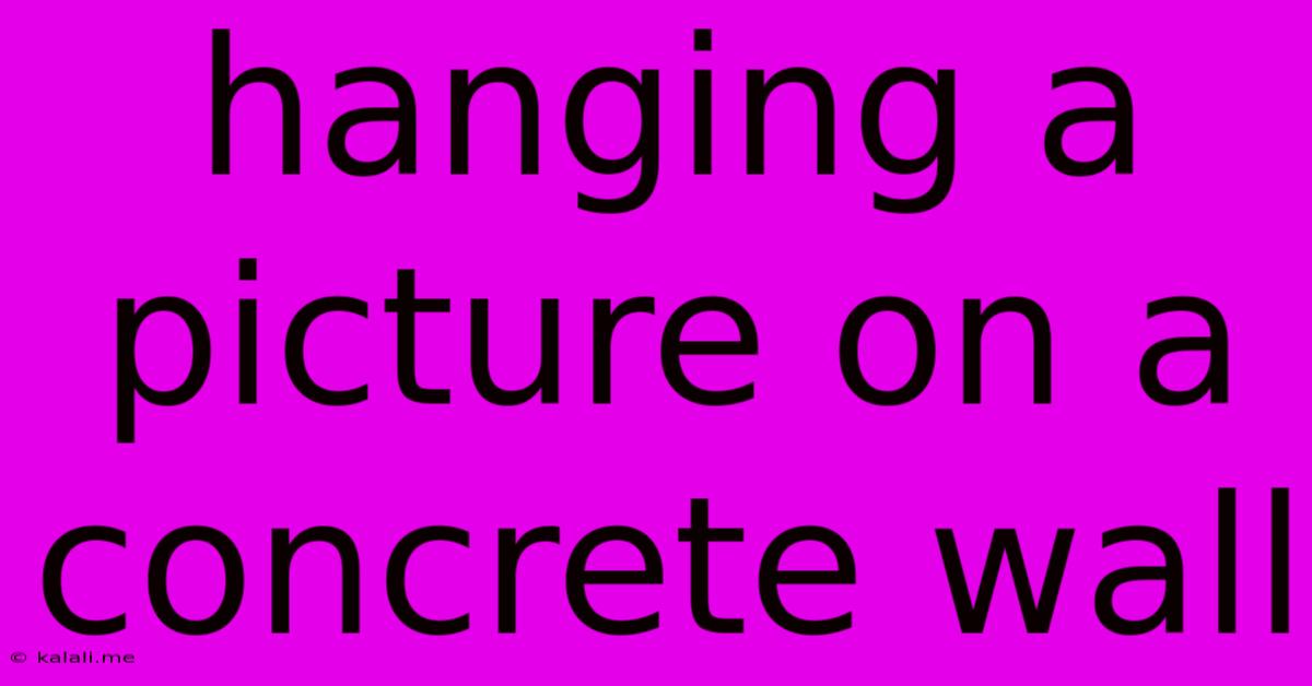 Hanging A Picture On A Concrete Wall