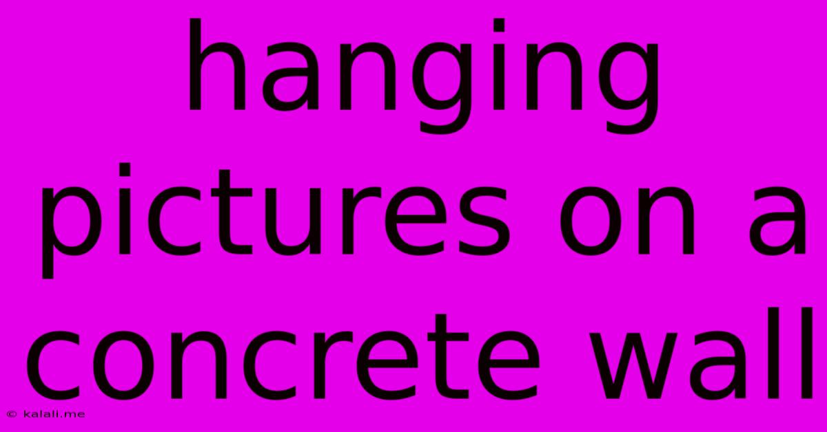 Hanging Pictures On A Concrete Wall